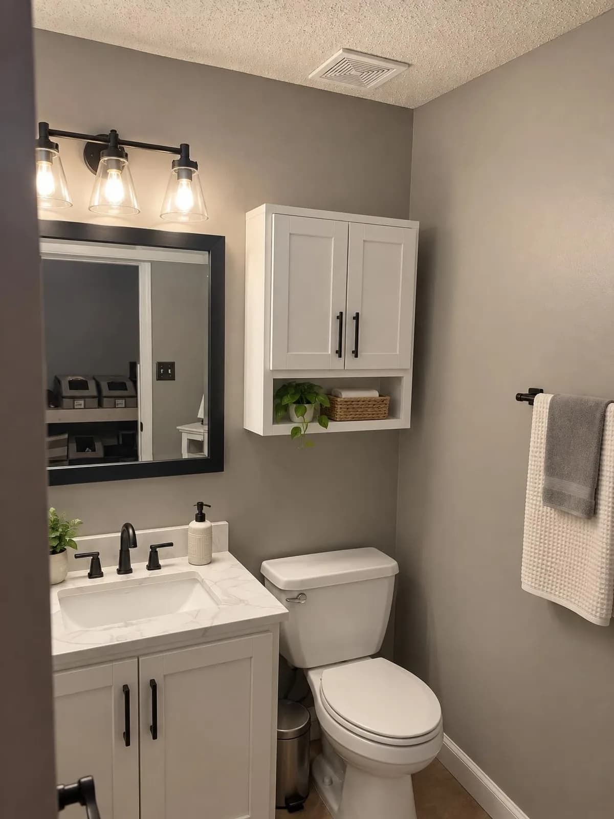 Bathroom remodel concept at a $15K budget (refresh), modern style, created by Renovue from the original photo